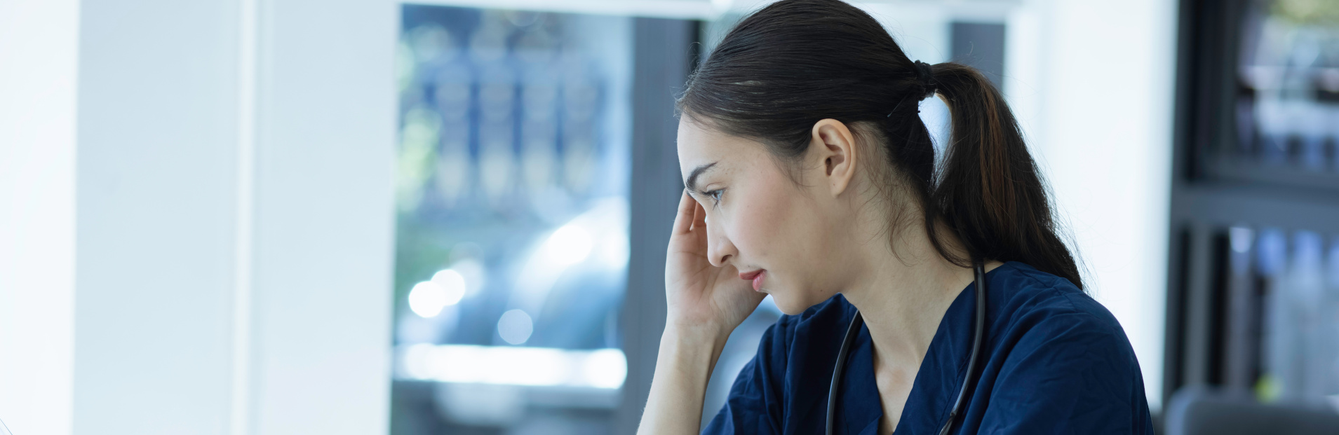 Doctor experiencing compassion fatigue.